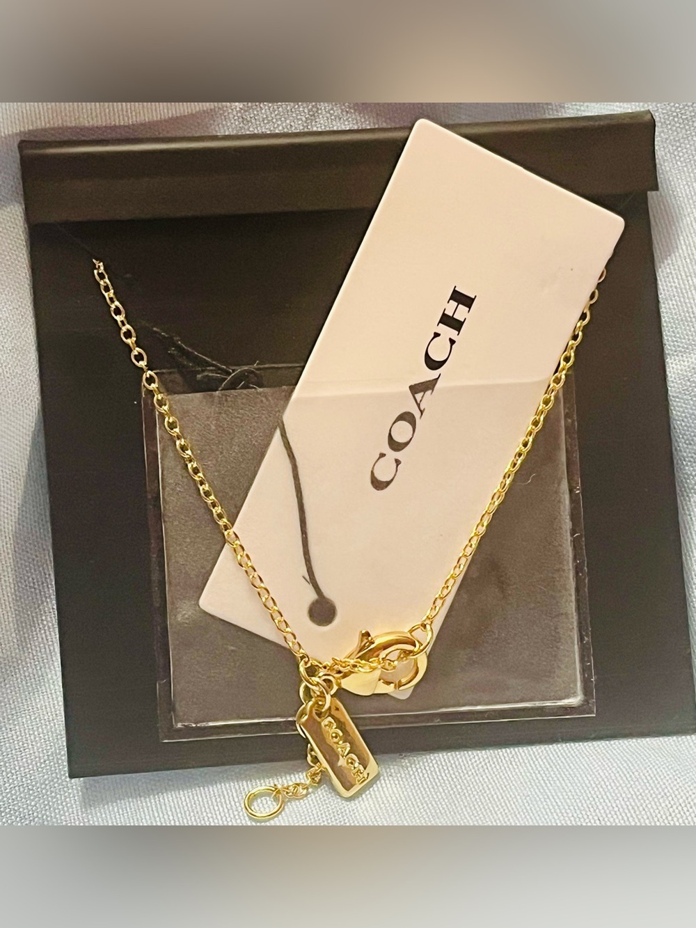 Coach Gold-Tone Crystal Circle 'C' Necklace - Picture 4 of 5